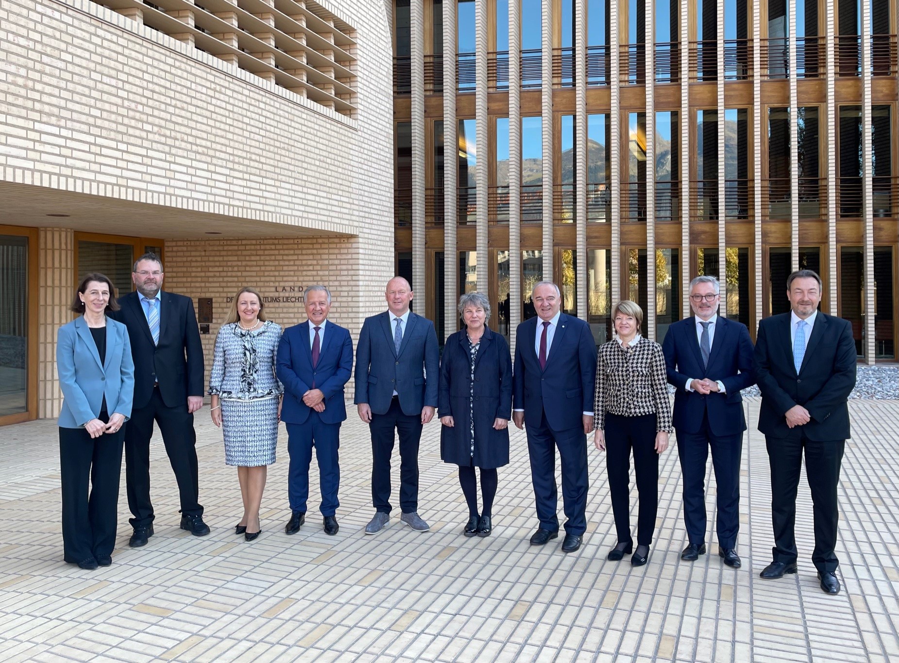 The delegation in front of the Liechtenstein parliament building